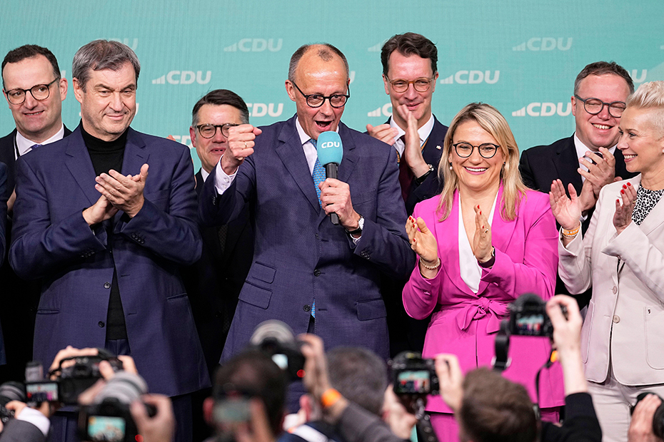 Friedrich Merz, the candidate of the mainstream conservative Christian Democratic Union party, addresses supporters at the party headquarters in Berlin, Germany