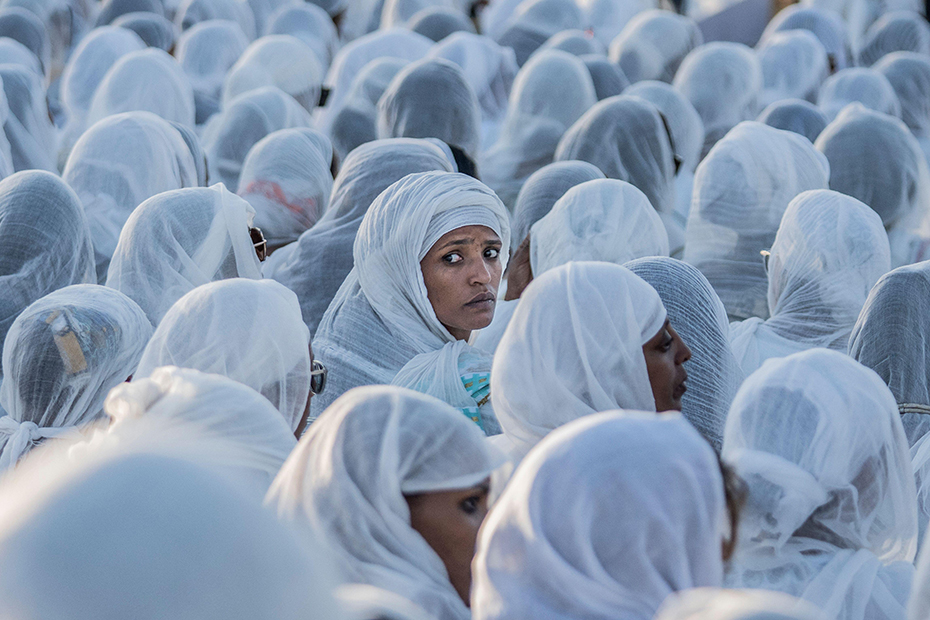 Worshippers gather on the eve of the Ethiopian Orthodox Christmas at Meskel Square in Addis Ababa, Ethiopia.
