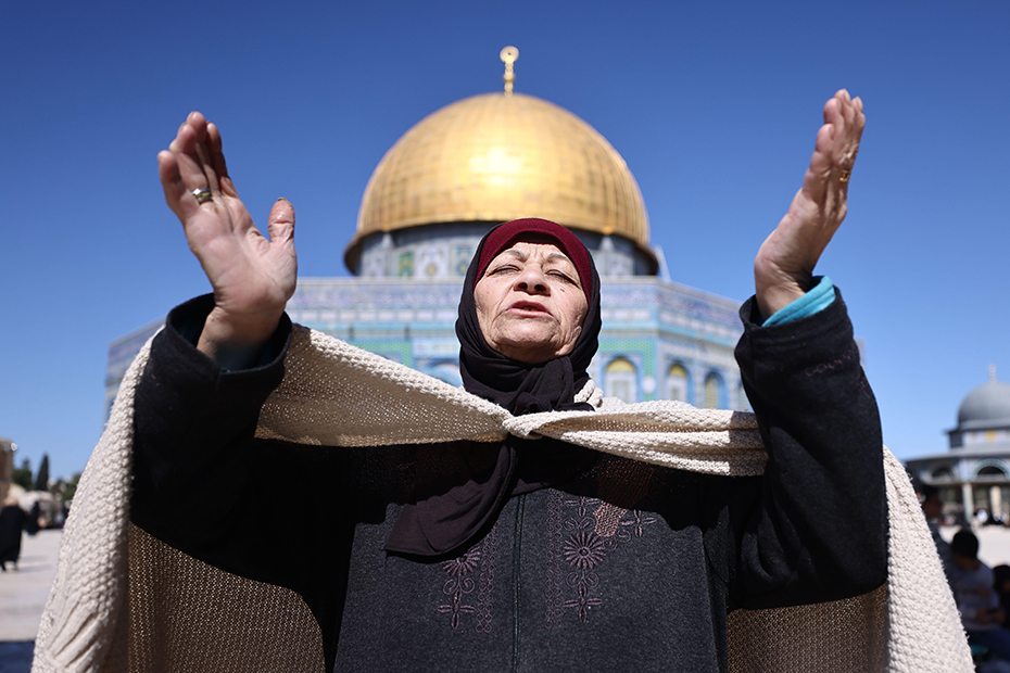 Worshippers gather for the first Friday prayers of the holy month of Ramadan at the Al-Aqsa Mosque compound in the Old City of Jerusalem.