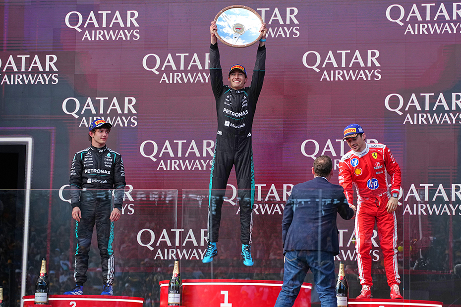 Mercedes driver George Russell celebrates after winning the Australian Formula One Grand Prix at Albert Park, in Melbourne, Australia.