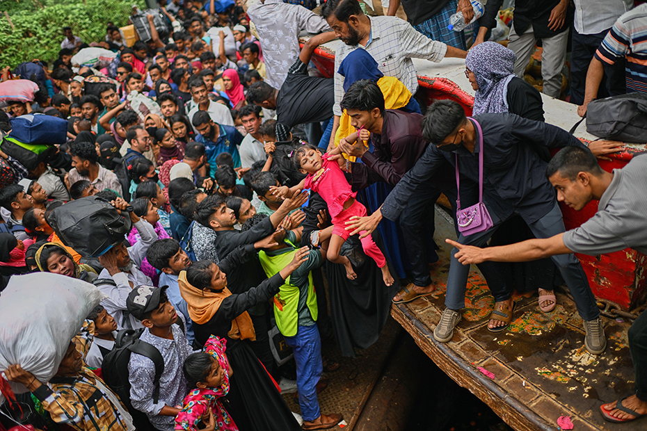 Thousands of travellers join the massive annual exodus to celebrate Eid al-Fitr in their hometowns, in Dhaka, Bangladesh 