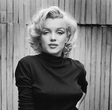 Portrait of American actress Marilyn Monroe (1926 - 1962) as she poses on the patio outside of her home, Hollywood, California, May 1953.